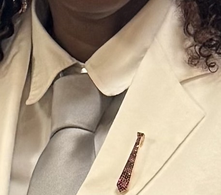 HAGE Founder's Circle brooch, worn on a lapel